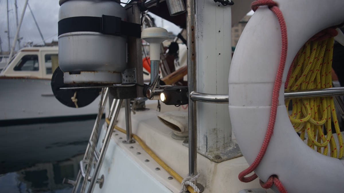 the makeshift aft light hanging on the stern rail