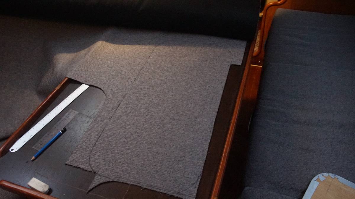 the fabric has a line drawing of the wooden backing