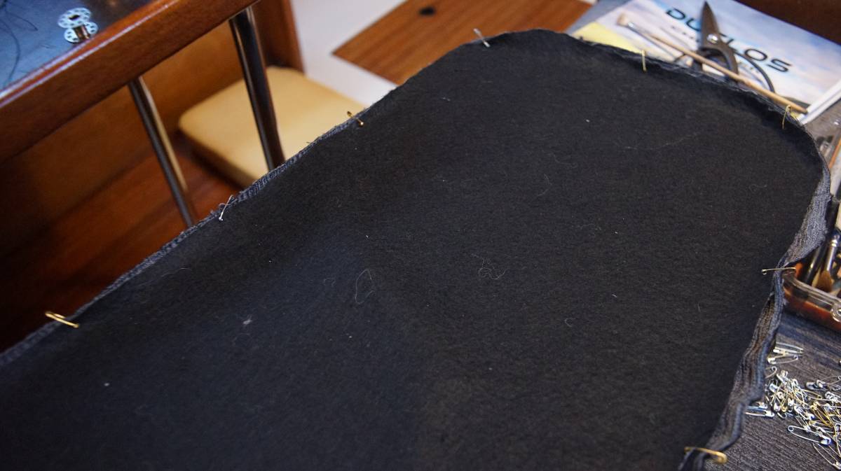 a general view of the top plaque and boxing held together with safety pins