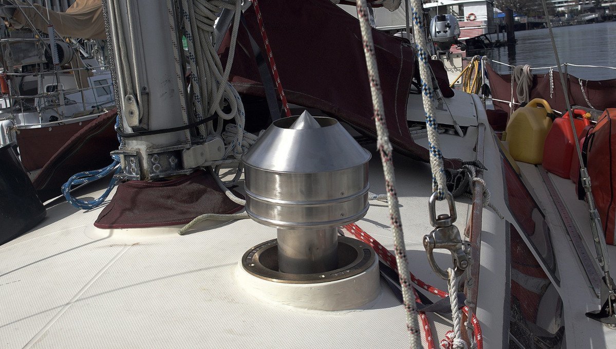 a smoke stack coming out of the deck of a plastic boat