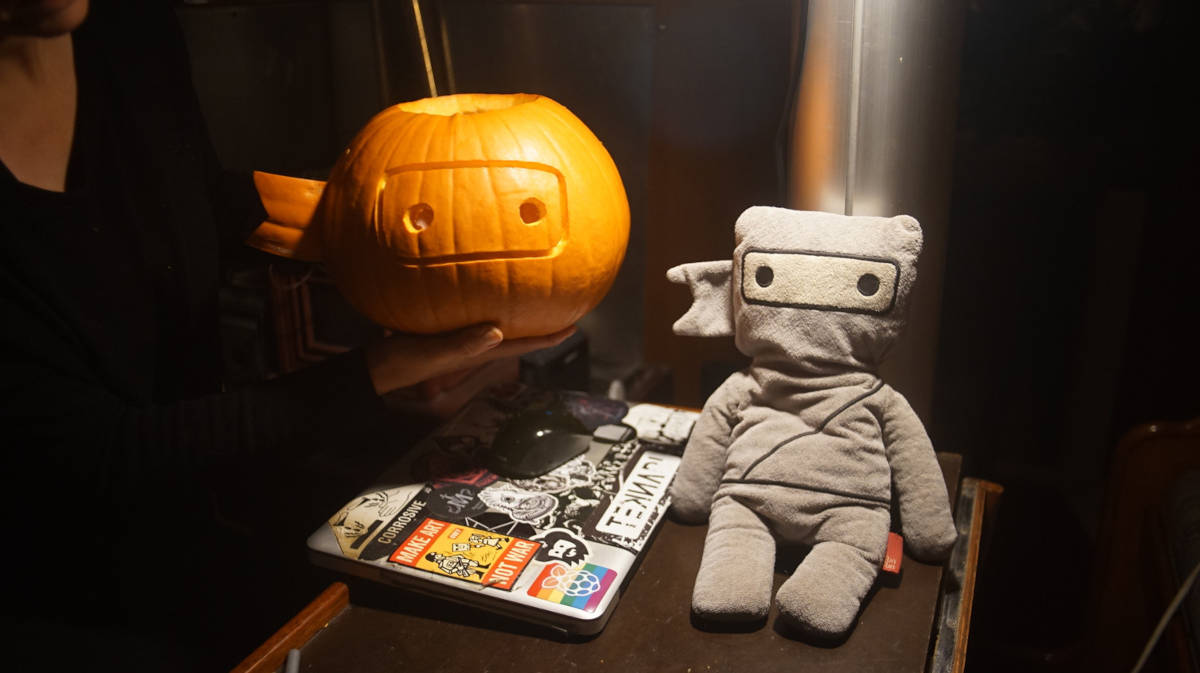 A photo of Ninjs face carved onto a pumpkin