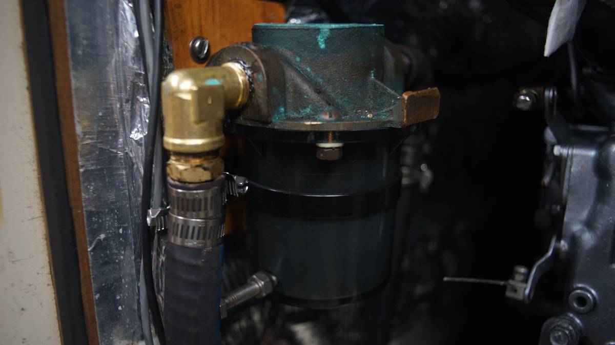 a diesel engine water filter full of opaque water