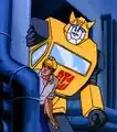 A boy and his giant transforming alien robot. Spike and Bumblebee from Transformers Generation 1.