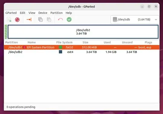 The target drive, loaded in GParted after being modified to match the structure of my original system. There are two partitions. The first partition - /dev/sdb1 - is named "EFI System Partition". It's formatted as fat32 and takes up 512MiB. It has the flags "boot" and "esp. The second partition - /dev/sdb2 - has no name. It's formatted as ext4, and takes up the remaining space on the drive. It has no flags.