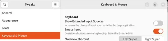 Screenshot of the Tweaks window showing the "Emacs Input" toggle inside the "Keyboard & Mouse" section.