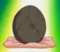 A fossilized Aerodactyl Egg in Putting the Air Back in Aerodactyl!