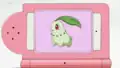 Dawn's Sinnoh Pokédex scanning Lyra's Chikorita