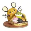 A figure of a Dedenne with Poké Puffs and a small portion of a Shalour Sable visible.