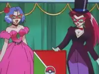 James as a female assistant and Jessie as a male magician