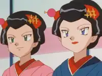 James (left) disguised as a Geisha girl