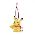 A christmas ornament featuring a Pikachu holding a cookie next to a bottle of Moomoo Milk.