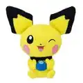 A plush toy of a Pichu holding an Oran Berry.