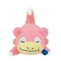 A plush toy of a Slowpoke holding an Oran Berry.