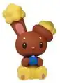 A figure of a Buneary holding an Oran Berry.