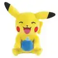 A plush toy of a Pikachu holding an Oran Berry.