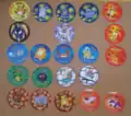 Some tazos from the first and second sets of Pokémon Tazo