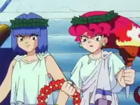 James dressed as an ancient Greek maiden