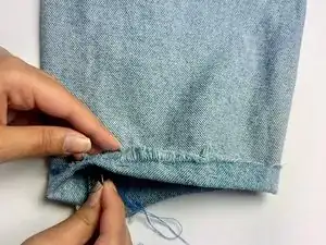 How to Fix Ripped Jeans Hem Without Shortening