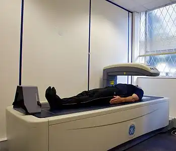 A DXA scanner in use.
