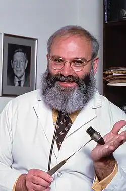A portrait of Oliver Sacks in his office