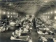 Soldiers from Fort Riley, Kansas, ill with Spanish flu at a hospital ward at Camp Funston