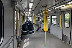 An almost empty SkyTrain; normally trains would be packed full of people.