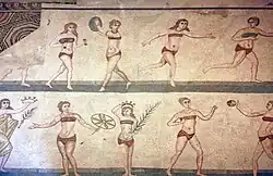 This mosaic, called the Coronation of the Winner and nicknamed the bikini girls, shows Roman women engaged in athletic activities such as swinging a discus, hitting a ball to each other, and stepping whilst using dumbbells. Villa Romana del Casale, 4th century AD.