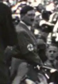 ...as an Ekosian in newsreel