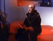 Anton Karidian with book