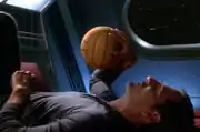 Archer with water polo ball
