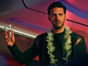 Ash Tyler with a lei