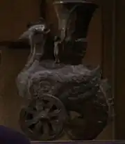 Bird on wheels sculpture