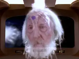 A Cytherian greets the crew of the USS Enterprise-D