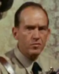 ... as an Ekosian SA party official