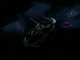 A Ferengi vessel approaches Empok Nor in 2374