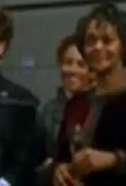 ...as a Human civilian (background)