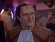 Garak wearing a bib