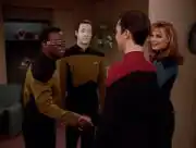 Geordi La Forge and Data greet Wesley Crusher