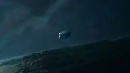 The Io Facility dwarfed by Jupiter and Io