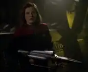 Janeway armed with compression phaser rifle