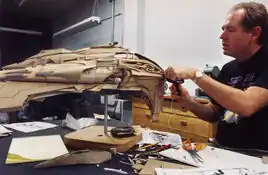 Kazon Fighter Studio model undergoing modifications by David Stipes