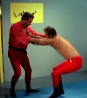 Kirk prepares to throw Sam