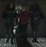 Klaa's guards escorting Kirk