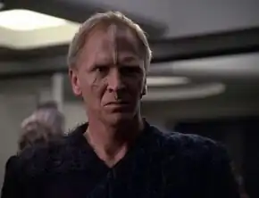 Lansor aboard Voyager in 2376