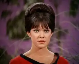 ...as Yeoman Leslie Thompson.