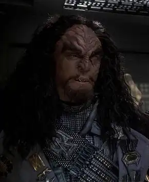 Martok, a male Chancellor of the Klingon High Council, in 2375