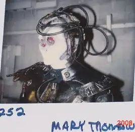 Thompson on a continuity Polaroid from TNG "Descent"