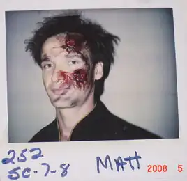 Goodrich on a makeup continuity polaroid from "Descent"
