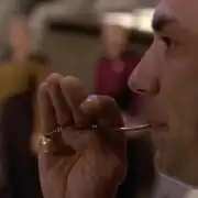 Operations division crewmember in shuttlebay 2, 2364