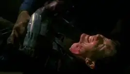 Parsons, wounded by a particle weapon